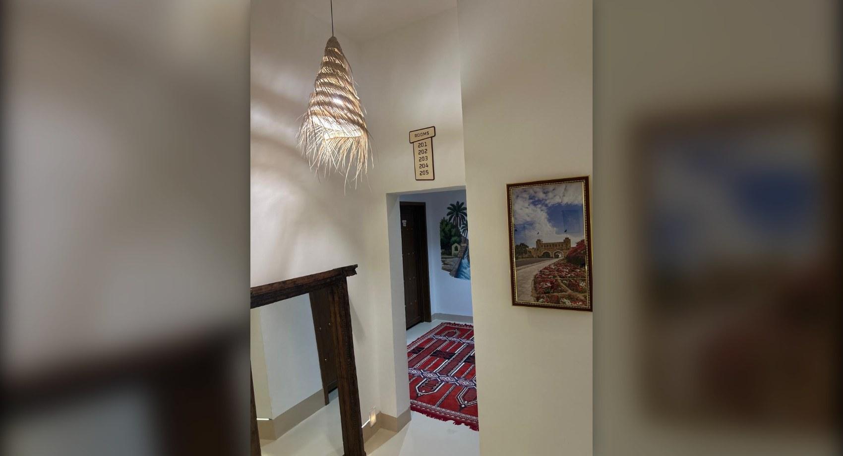 Stairs up to rooms 201 to 205